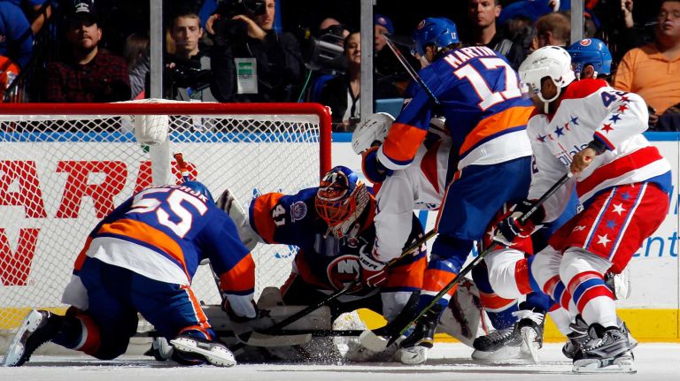 Islanders-Capitals playoff schedule 2 Jaroslav Halak #41 of the New York Islanders makes a save against the Washington Capitals during a game at the Nassau Coliseum on Dec. 29, 2014.