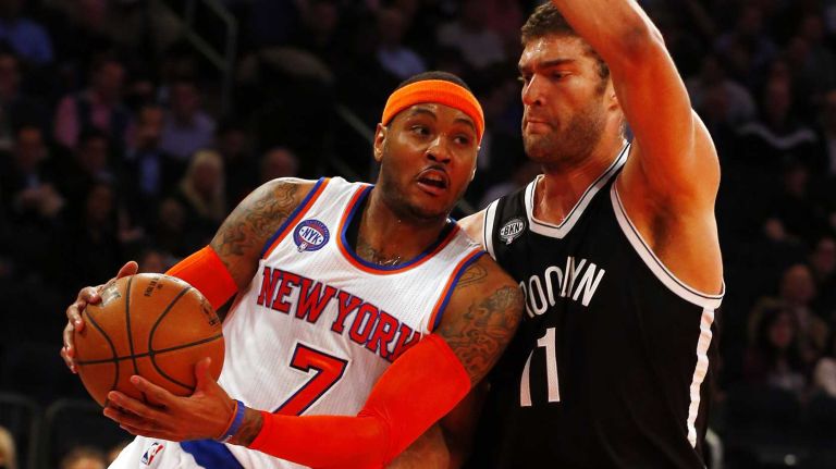 Knicks vs. Nets 22 Carmelo Anthony of the New York Knicks tries to drive to the hoop in the first half against Brook Lopez of the Brooklyn Nets at Madison Square Garden on Tuesday, Dec. 2, 2014.
