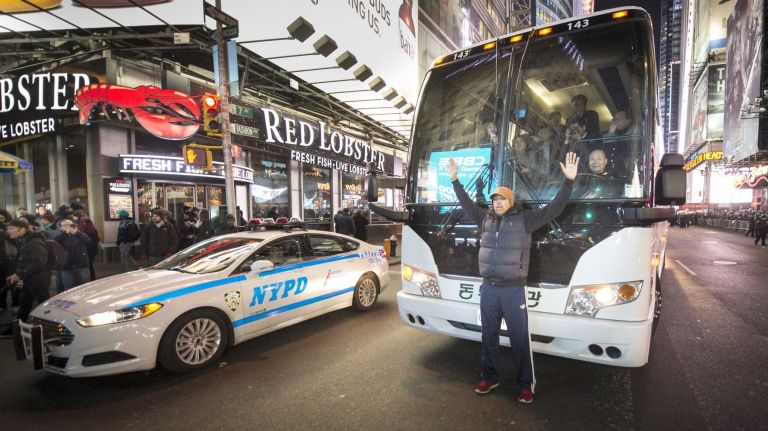 I found my privilege sitting in traffic 2 Marvin Day, of Jackson Heights, holds up a large bus on Seventh Avenue in Times Square on Dec. 4, 2014 in protests over the death of Eric Garner.