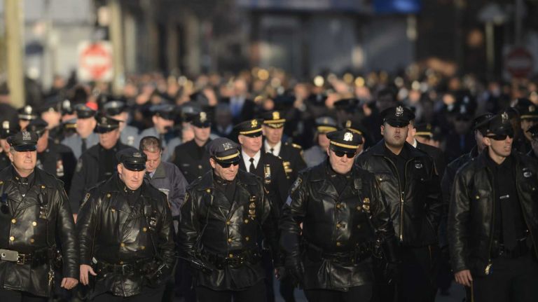 Rafael Ramos, slain NYPD officer, remembered at Queens wake 23 Law enforcement officers and first responders arrive at the funeral for NYPD Officer Rafael Ramos at Christ Tabernacle Church in Queens on Saturday, Dec. 27, 2014.