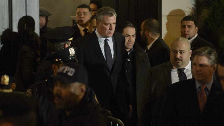 Rafael Ramos, slain NYPD officer, remembered at Queens wake 24 Mayor Bill de Blasio leaves the wake for NYPD Officer Rafael Ramos at Christ Tabernacle Church in Queens on Friday, Dec. 26, 2014.