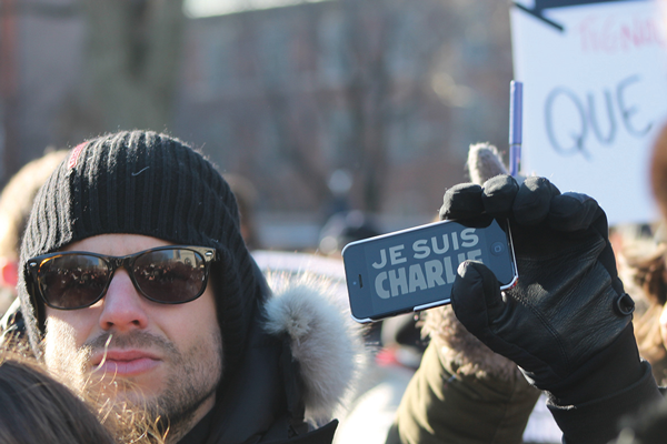 Whether on signs or smartphones, the message was one and the same: “Je Suis Charlie.”
