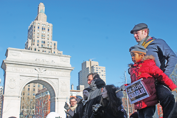 Grief, Solidarity and Resolve as French Expats Gather 1 Photo by Zach Williams Hundreds gathered at Washington Square Park on Jan. 10 in solidarity with victims of the Paris massacre.