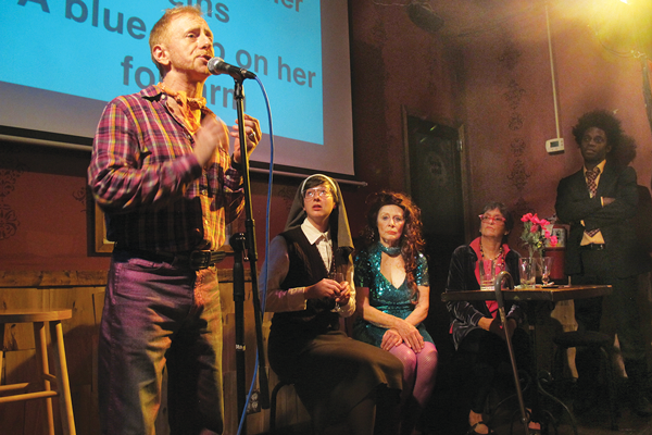 A karaoke bar is your fourth and final stop, when the audience joins a cast of intersecting characters at “The Golden Toad.”  Photo by Suzanne Opton