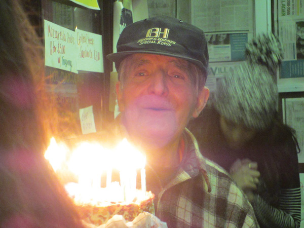 Amy Sanchez presented Ray with the cake.  Photos courtesy Ray’s Candy Store