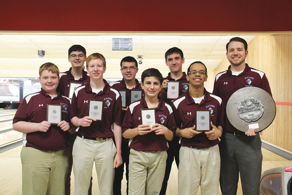The Xavier J.V. bowling team with their awards after the championship competition.