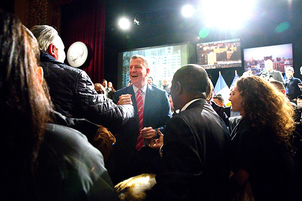 Mayor Bill de Blasio shook hands with a supporter after his State of the City speech.  Photos by William Alastriste / NYC Council