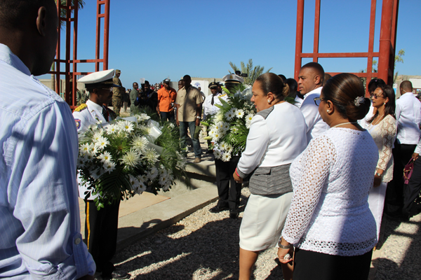 President Martelly and his wife, Sophia, receiving wreaths to lay at the memorial.