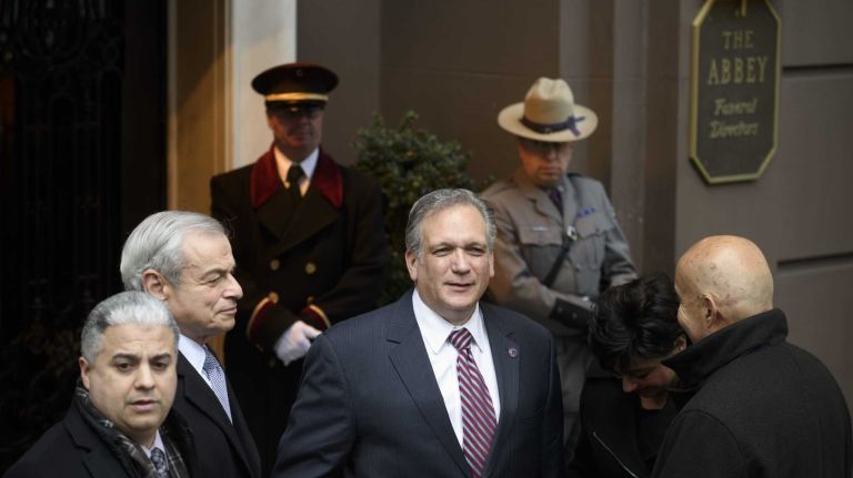 Nassau County Executive Ed Mangano, center, arrives at Frank E. Campbell Funeral Chapel for the wake of former Gov. Mario Cuomo in Manhattan on Monday, Jan. 05, 2015. Cuomo, who served three terms as New York State Governor, died at home Thursday from heart failure at 82 while surrounded by family. The death occurred on the same day Andrew Cuomo was sworn into office for his second term as governor.