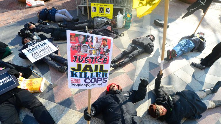 Protesters participate in a 