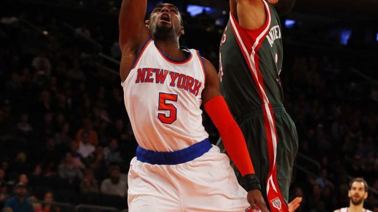 Giannis Antetokounmpo #34 of the Milwaukee Bucks blocks a shot from Tim Hardaway Jr. #5 of the New York Knicks at Madison Square Garden on Sunday, Jan. 4, 2015.