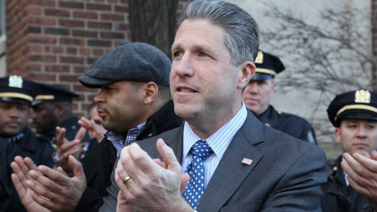 PBA president Pat Lynch comments and applauds as police officer Aliro Pellerano, one of the officers shot in the Bronx, as he leaves St. Barnabas Hospital on Wednesday, Jan. 7, 2015 in the Bronx.