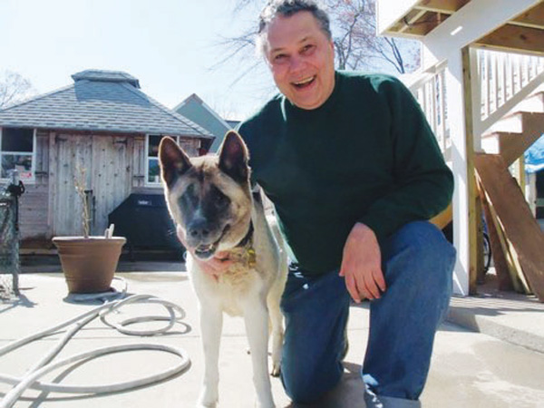 Robert Marino and his beloved Akita, Bella.