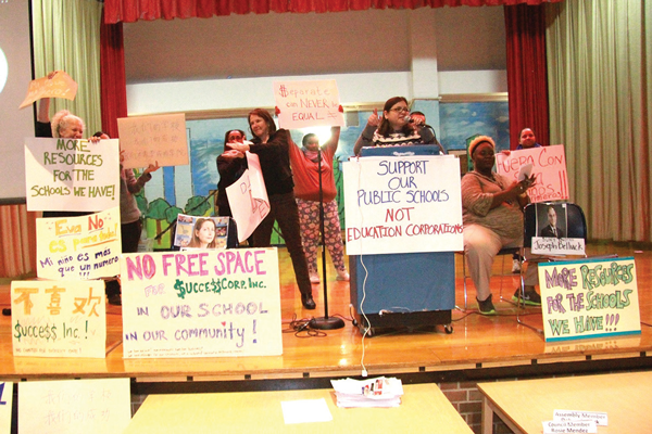 Councilmember Rosie Mendez, at podium with microphone, forged ahead with the hearing, even though the Department of Education had tried to cancel it at the last minute.  Photo by Clayton Patterson