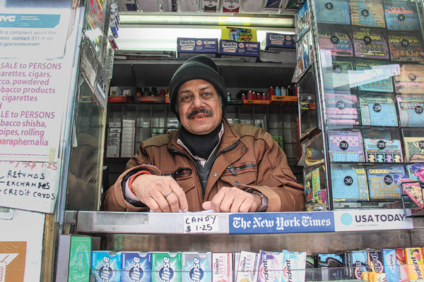 Extra! Newsvendor retiring, will live in ‘world’s oldest city’ 2 Vinay Anadjee on Wednesday at the Sheridan Square newsstand, his last morning on the job. Photos by Tequila Minsky