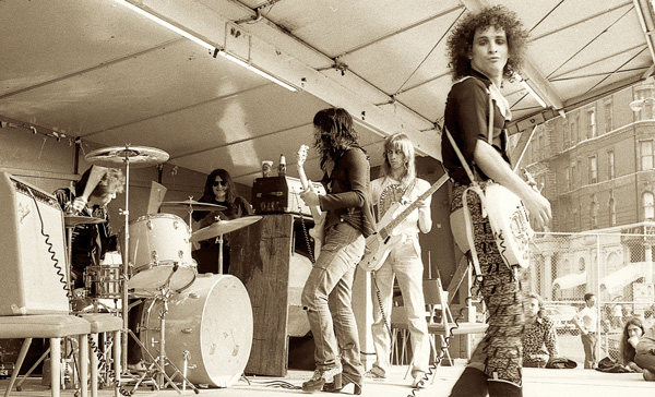 © 2015 Darleen Rubin The New York Dolls play a 1974 Save Our Libraries rally, in an image from Darleen Rubin’s “Before The Garden” exhibit (through Feb. 25 at Jefferson Market Library).