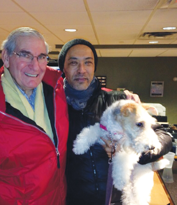 Courtesy of Morris Borock Quick thinking on the part of Morris Borock (left) and other helpful humans orchestrated a happy reunion between Orlando Straughter and his wirehaired fox terrier, Fritz.