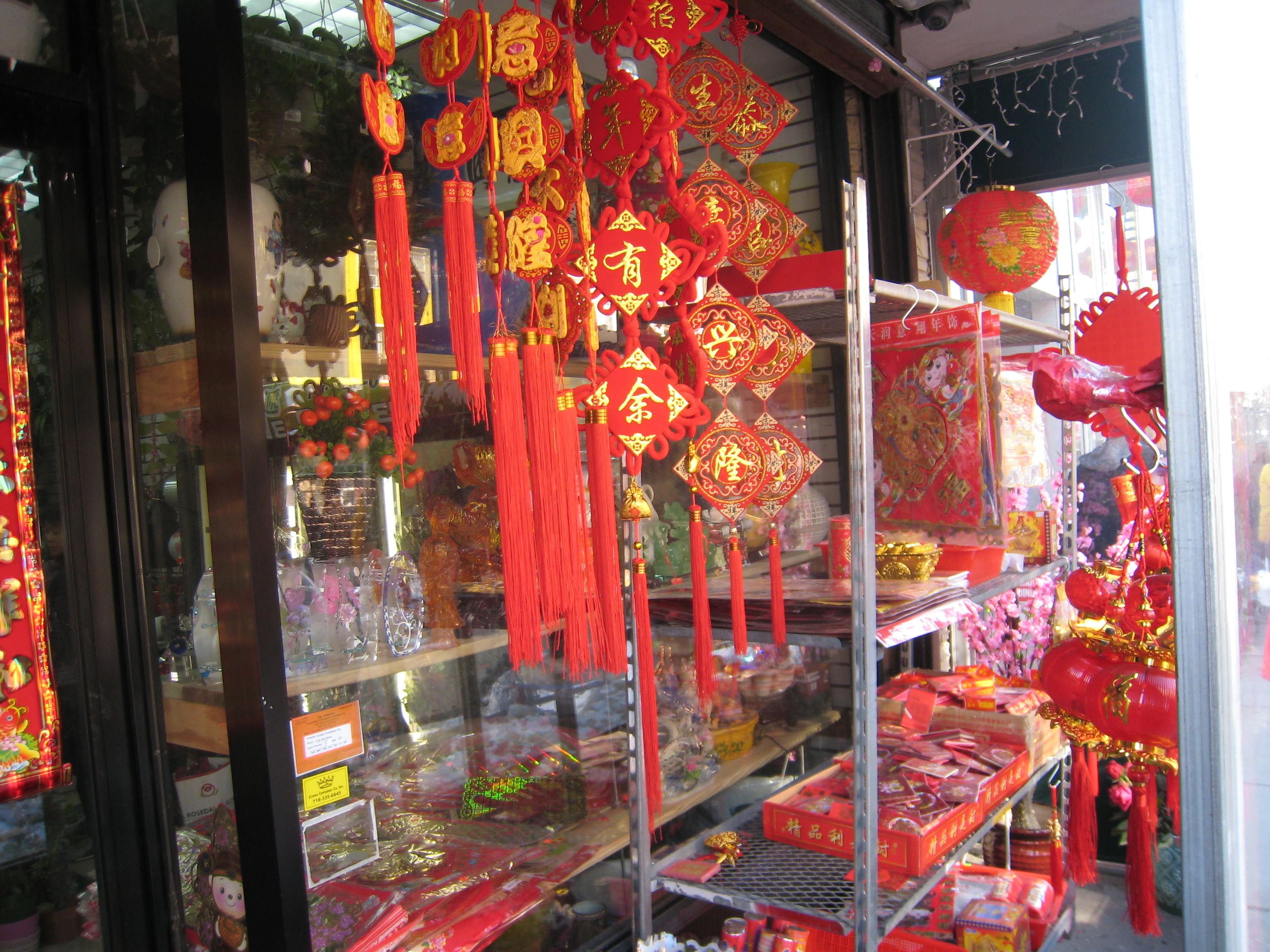 Festive red hangings and paper cuttings are a staple of Lunar New Year.  
