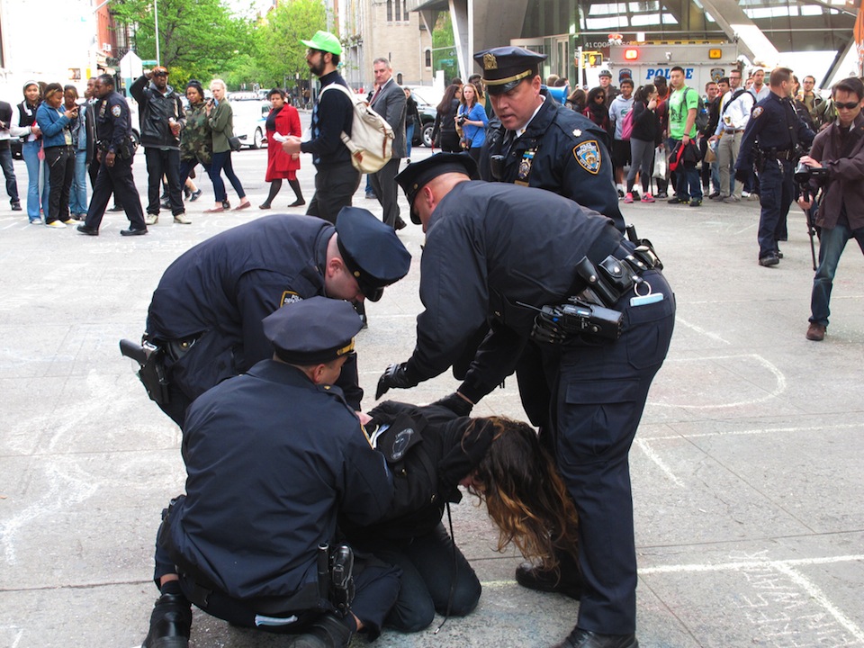 A protester being arrested at The Cooper Union in 2012 during a demonstration against the school implementing tuition.   Photo by Gerard Flynn