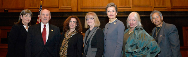 At the opening of “Courtroom Art: Eyewitness for the Public 1972-2011,” from left, courtroom sketch artist Elizabeth Williams, Judge P. Kevin Castel, artist Jane Rosenberg, artist Aggie Kenny, Chief Judge Loretta A. Preska, artist Christine Cornell and Judge Deborah Batts.   Photo by Jefferson Siegel