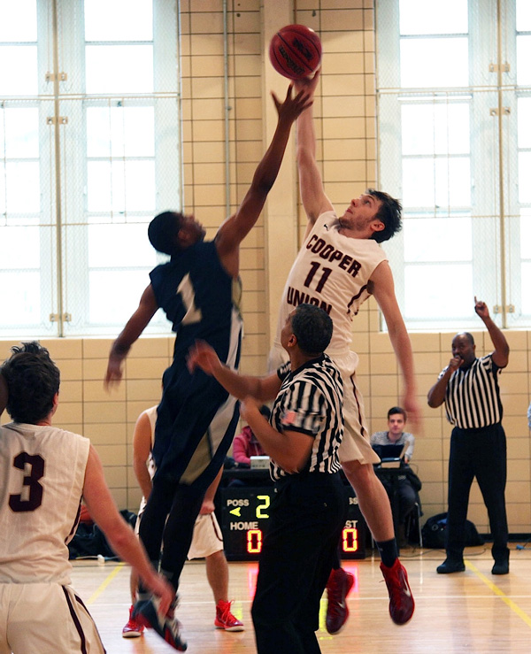 Andrew Keane won the tipoff versus Landmark College.  Photos by Antonia Stoyanovich