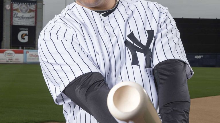 New York Yankees outfielder Carlos Beltran at George Steinbrenner Field poses at George Steinbrenner Field during spring training in Tampa, Fla. on Feb. 28, 2015.