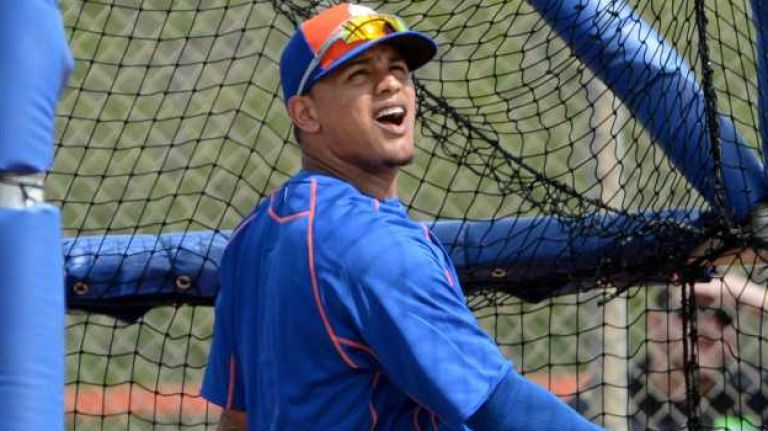 Mets outfielder Juan Lagares takes batting practice during a spring training workout on Tuesday, Feb. 24, 2015.