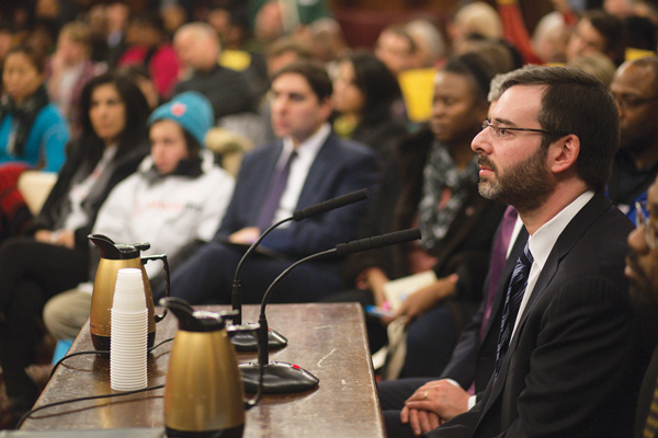 David Hantman, Airbnb’s head of global public policy, right, told the City Council hearing on Jan. 20 that New York City should ease its restrictions against short-term rentals. “Amsterdam, Hamburg, San Jose, Portugal, San Francisco, Portland and Paris have all passed new laws within the last year to clear the path for renting out one’s own home,” he testified.  Photo by William Alatriste/NYC council