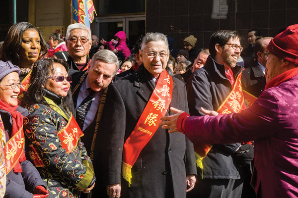 Downtown Express photo by Milo Hess. Assemblymember Sheldon Silver, center, marching in Chinatown’s Lunar New Year parade Feb. 22. At far left is Councilmember Margaret Chin and at far right is State Sen. Daniel Squadron. Leaning in: Assemblymember David Weprin, and at back left: Public Advocate Letitia James. 