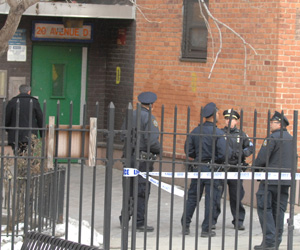 Police at the Lillian Wald Houses on Monday after Shemrod Isaac’s fatal shooting.  PHOTO BY C4P