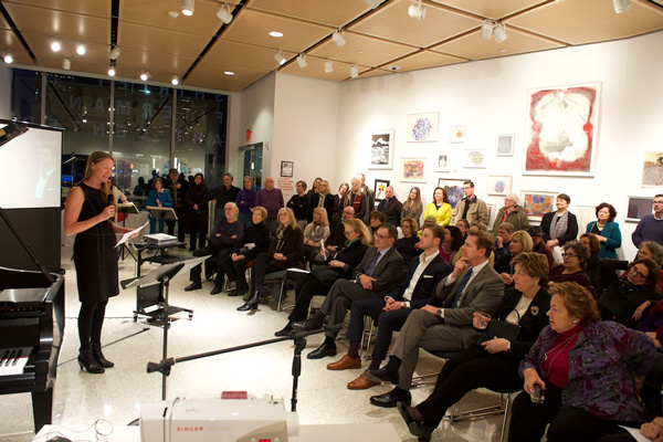 Photo by Louis Chan  Curator Kathleen Kucka, speaking at the Art Center. 