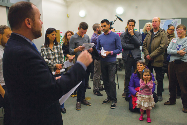 Photos by Zach Williams This is the first year that District 3 residents have voted for how $1 million in funding from the office of Councilmember Corey Johnson (left, addressing crowd) could be used to further community interests. 