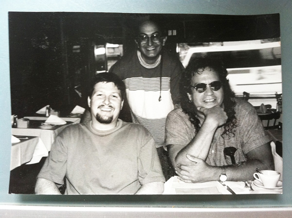 At Pisces restaurant in the East Village in the 1990s, Amnon Kehati, standing at rear, with his business partner, Pini Milstein, right, and their chef.   Photo courtesy Pini Milstein
