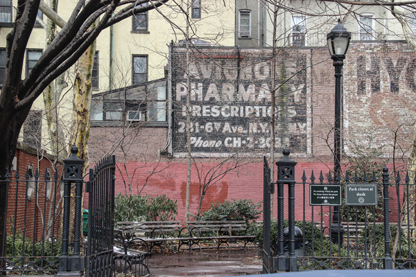 A “ghost sign,” an old ad for Avignone in Churchill Square park, right near the former pharmacy.