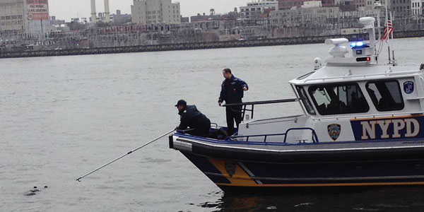 Harbor Patrol police pulled the unconscious woman out of the East River on March 10 before resuscitating her with C.P.R.  Photo by Fly