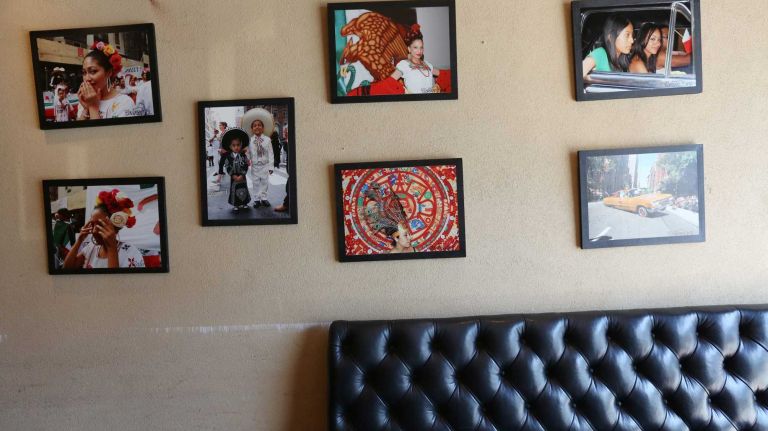 Pictures on the wall at Los Hermanos Tacos at 271 Starr St. in Bushwick. 