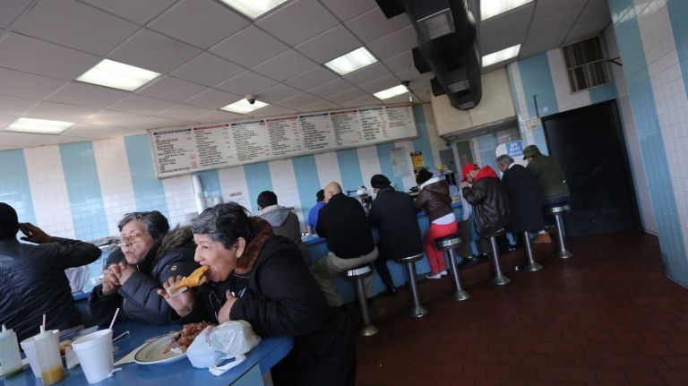 The counter at La Isla Cuchifrito at the corner of Knickerbocker and Myrtle in Bushwick.