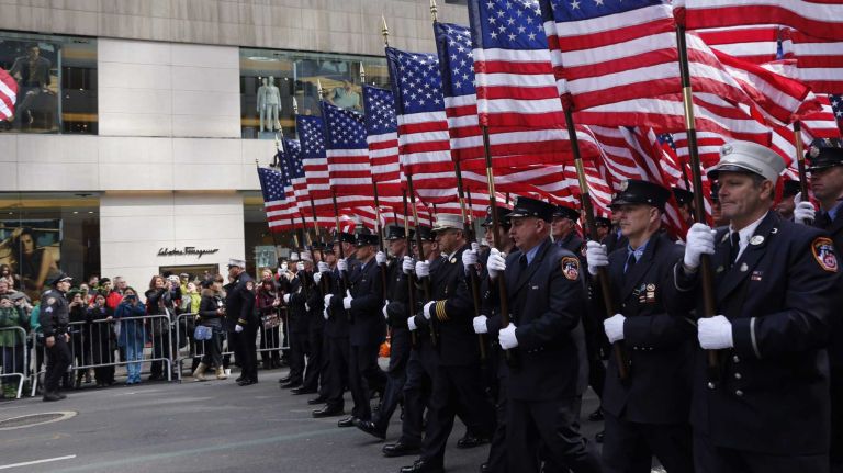 Members of the NYPD march in the 245th annual New York City St. Patrick's Day parade along Fifth Avenue in Manhattan on Tuesday, March 17, 2015.