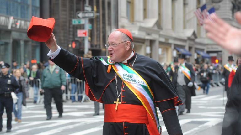 Grand Marshall Cardinal Timothy Dolan waves at the St. Patrick's Day Parade in Manhattan on March 17, 2015.