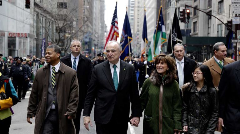 New York City Police Commissioner William Bratton and wife Rikki Klieman march in the 245th annual St. Patrick's Day parade along Fifth Avenue on Tuesday, March 17, 2015.