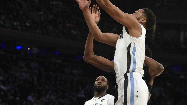 Villanova Wildcats guard Darrun Hilliard II sinks a layup against the Providence Friars in a Big East semifinal men's basketball game at Madison Square Garden on Friday, March 13, 2015.