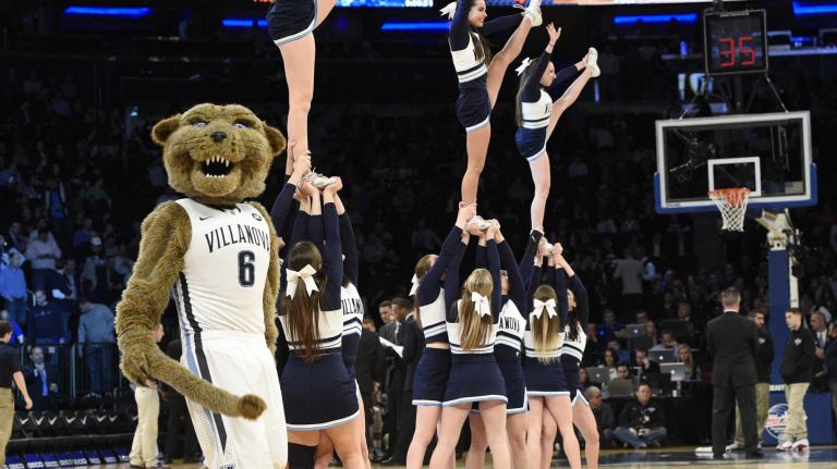 The Villanova Wildcats mascot and cheerleaders perform during a timeout against the Providence Friars in a Big East semifinal men's basketball game at Madison Square Garden on Friday, March 13, 2015.