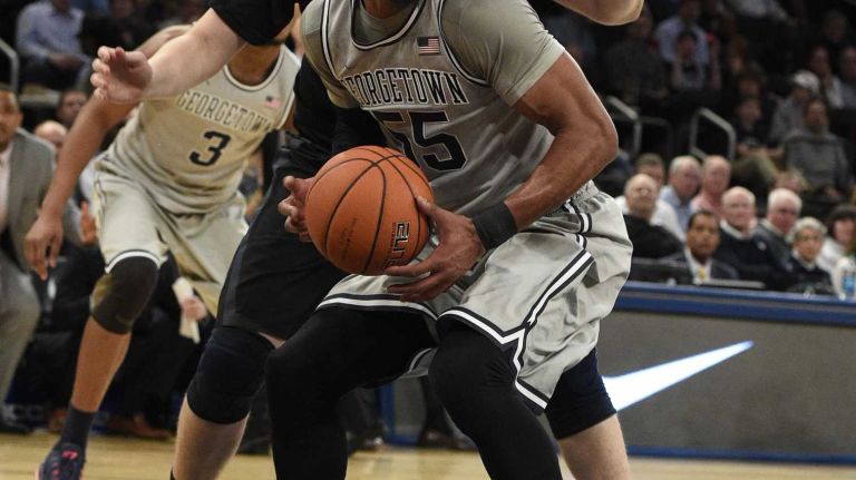 Big East Tournament semifinal: Georgetown vs. Xavier 37 Georgetown Hoyas guard Jabril Trawick sets to shoot past Xavier Musketeers center Matt Stainbrook in a Big East semifinal men's basketball game at Madison Square Garden on Friday, March 13, 2015.