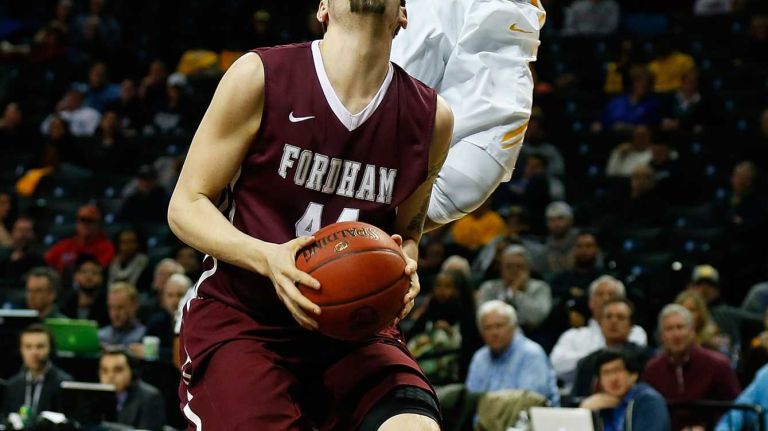 NEW YORK, NY - MARCH 12: Jonathan Williams #10 of the Virginia Commonwealth Rams defends against Manny Suarez #44 of the Fordham Rams during the Second Round of the Atlantic 10 Basketball Tournament at Barclays Center on March 12, 2015 in New York, New York. (Photo by Mike Stobe/Getty Images)