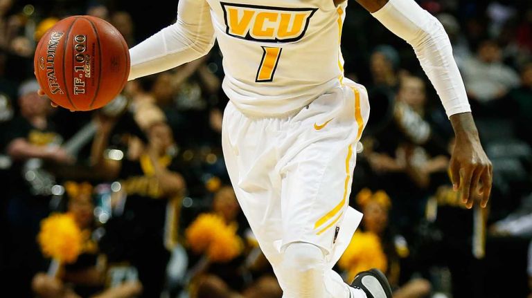 NEW YORK, NY - MARCH 12: JeQuan Lewis #1 of the Virginia Commonwealth Rams brings the ball upcourt against the Fordham Rams during the Second Round of the Atlantic 10 Basketball Tournament at Barclays Center on March 12, 2015 in New York, New York. (Photo by Mike Stobe/Getty Images)