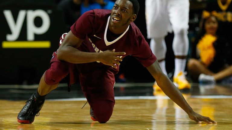 NEW YORK, NY - MARCH 12: Antwoine Anderson #0 of the Fordham Rams reacts against Virginia Commonwealth Rams during the Second Round of the Atlantic 10 Basketball Tournament at Barclays Center on March 12, 2015 in New York, New York. (Photo by Mike Stobe/Getty Images)