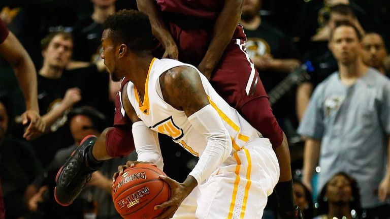 NEW YORK, NY - MARCH 12: Antwoine Anderson #0 of the Fordham Rams defends against JeQuan Lewis #1 of the Virginia Commonwealth Rams during the Second Round of the Atlantic 10 Basketball Tournament at Barclays Center on March 12, 2015 in New York, New York. (Photo by Mike Stobe/Getty Images)