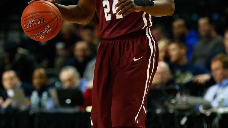 NEW YORK, NY - MARCH 12: Bryan Smith #24 of the Fordham Rams dribbles the ball against Virginia Commonwealth Rams during the Second Round of the Atlantic 10 Basketball Tournament at Barclays Center on March 12, 2015 in New York, New York. Virginia Commonwealth Rams defeated the Fordham Rams 63-57. (Photo by Mike Stobe/Getty Images)