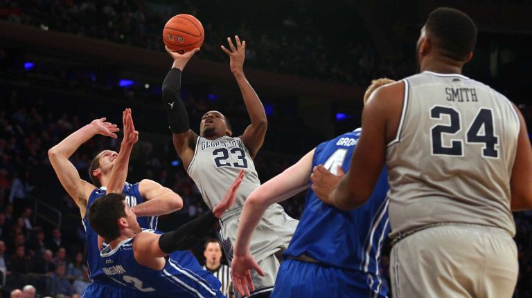 Georgetown Hoyas forward Aaron Bowen drives to the basket against Creighton Bluejays guard Avery Dingman during the first half of a Big East Tournament game at Madison Square Garden on Thursday, March 12, 2015.