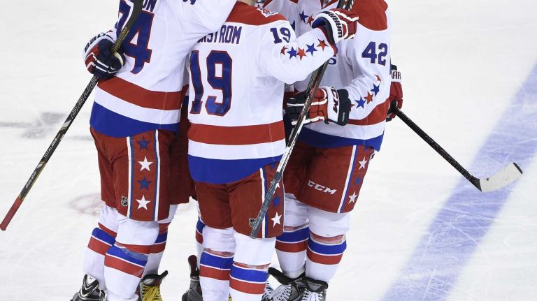 Rangers vs. Capitals 34 The Washington Capitals celebrate a goal by Washington Capitals left wing Alex Ovechkin against the New York Rangers in the second period of an NHL hockey game at Madison Square Garden on Sunday, March 29, 2015.